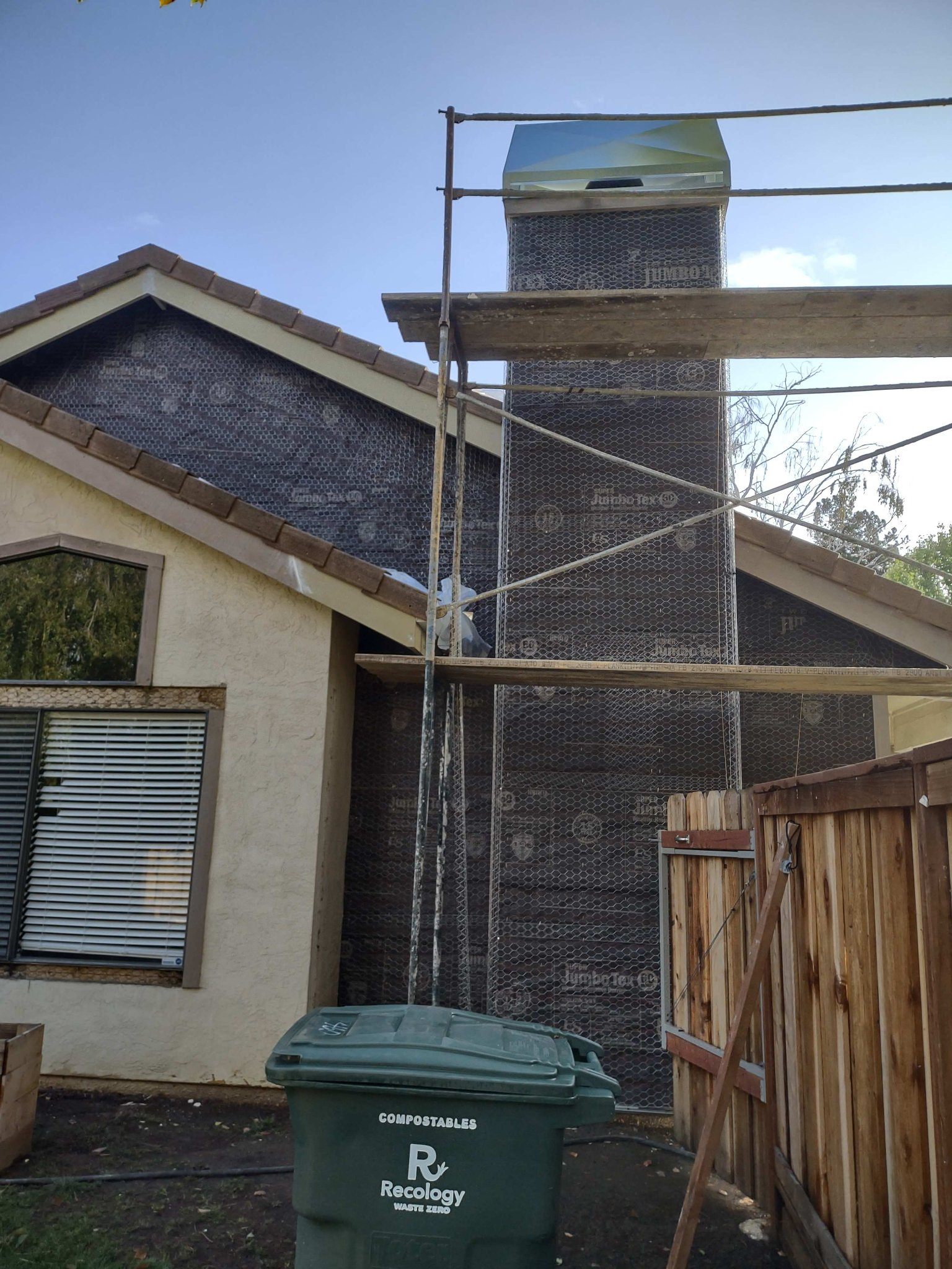 Stucco repair near chimney