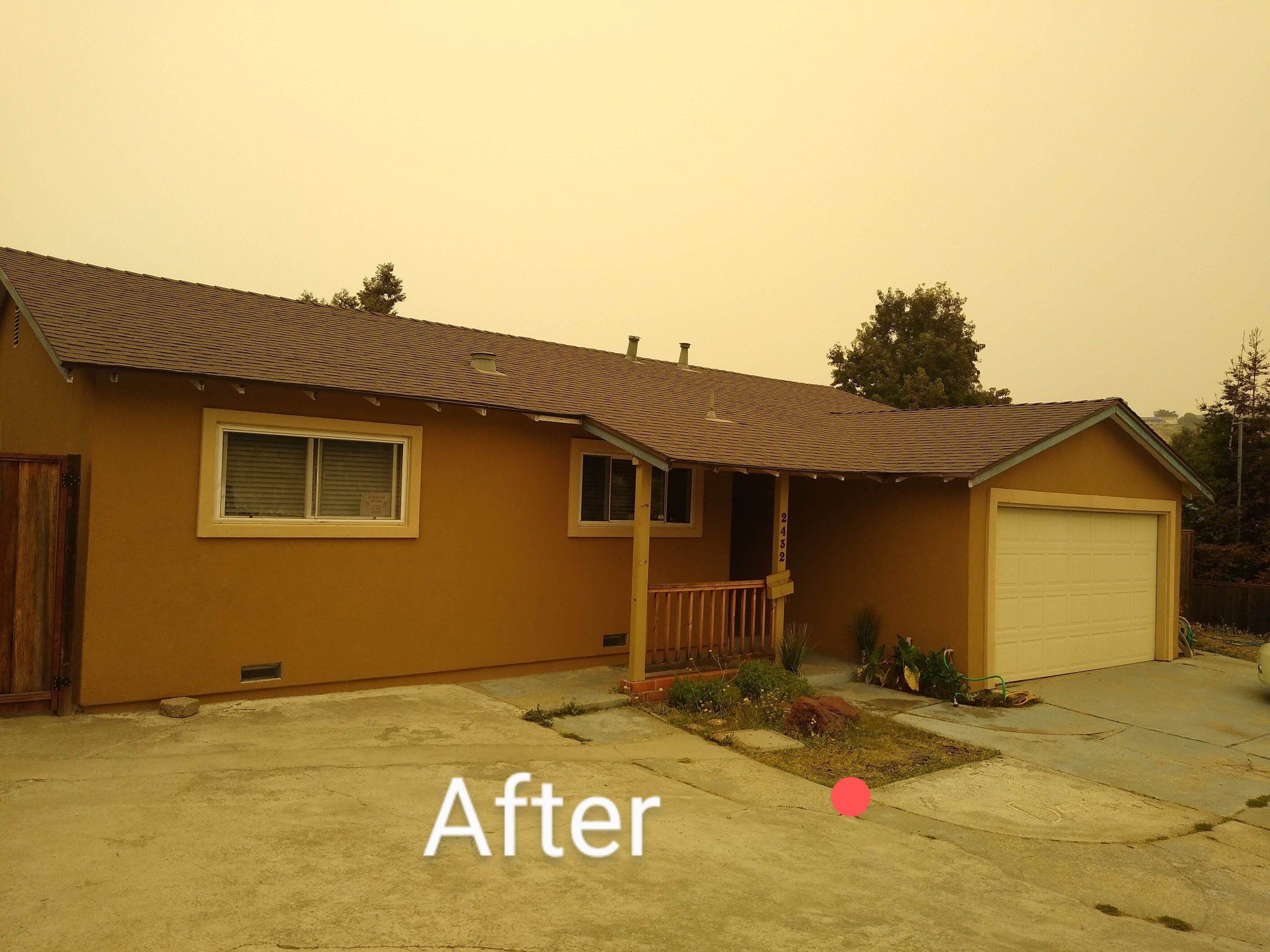 After photo of exterior painting and stucco work