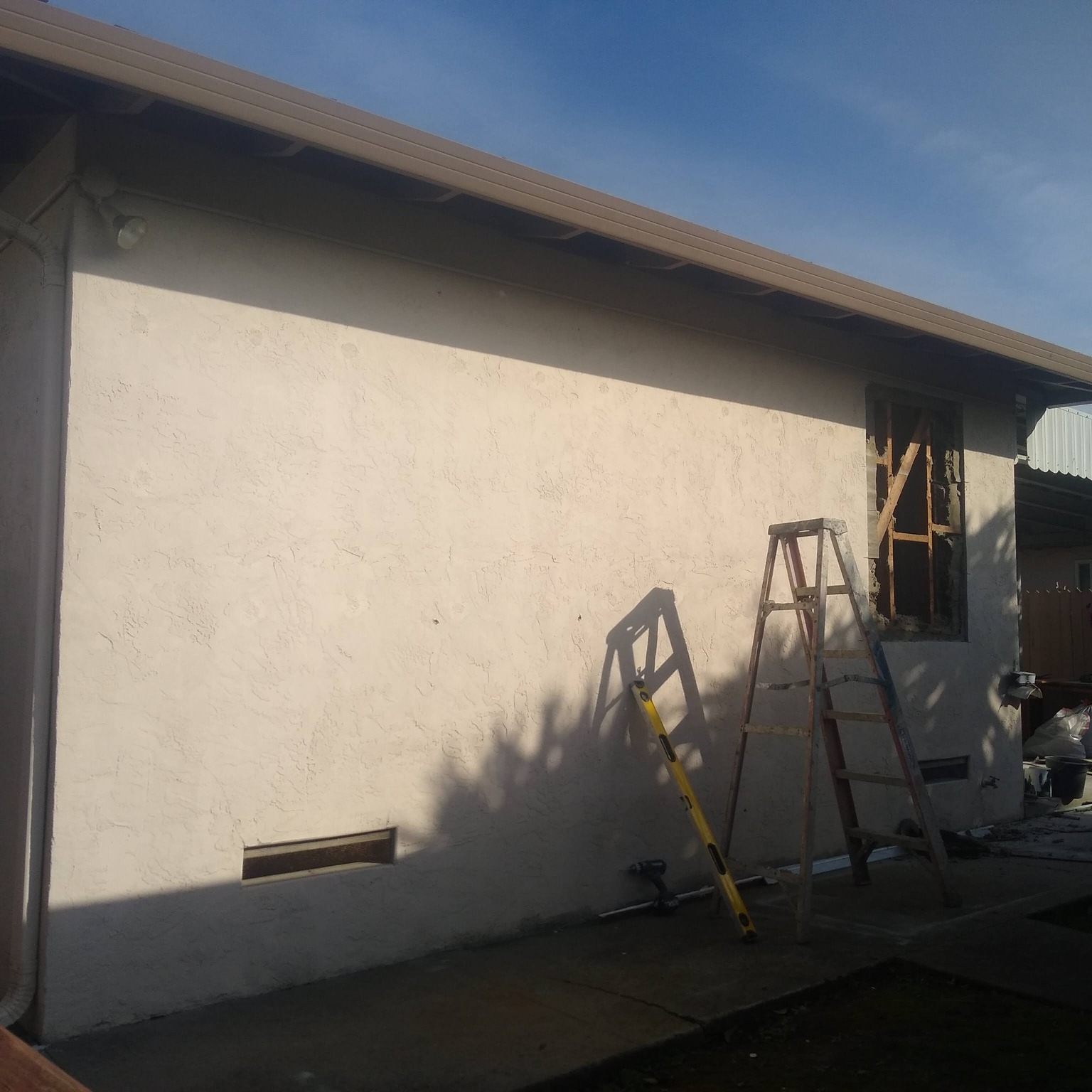 Smooth exterior wall finish